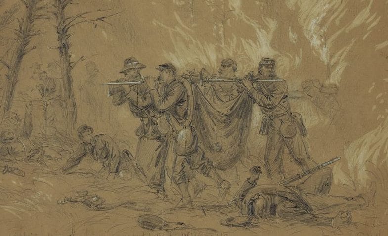 Sketch of the removal of wounded soldiers from the flames brought on by the Wilderness Battle. Sketch by Alfred Waud. Library of Congress.